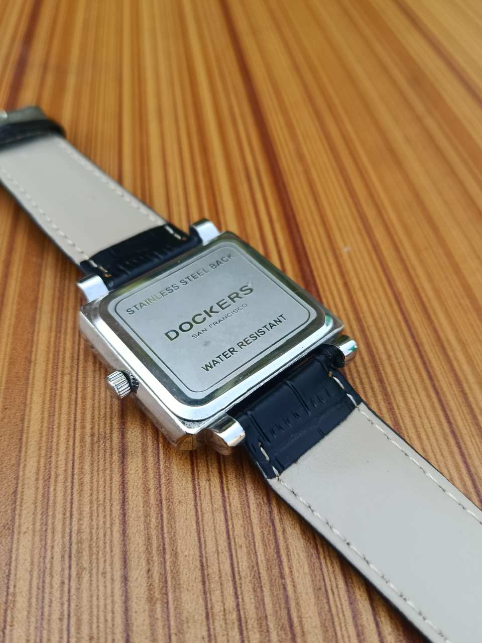 Dockers Men’s Quartz Watch Square Silver Case with Black Embossed Leather Strap