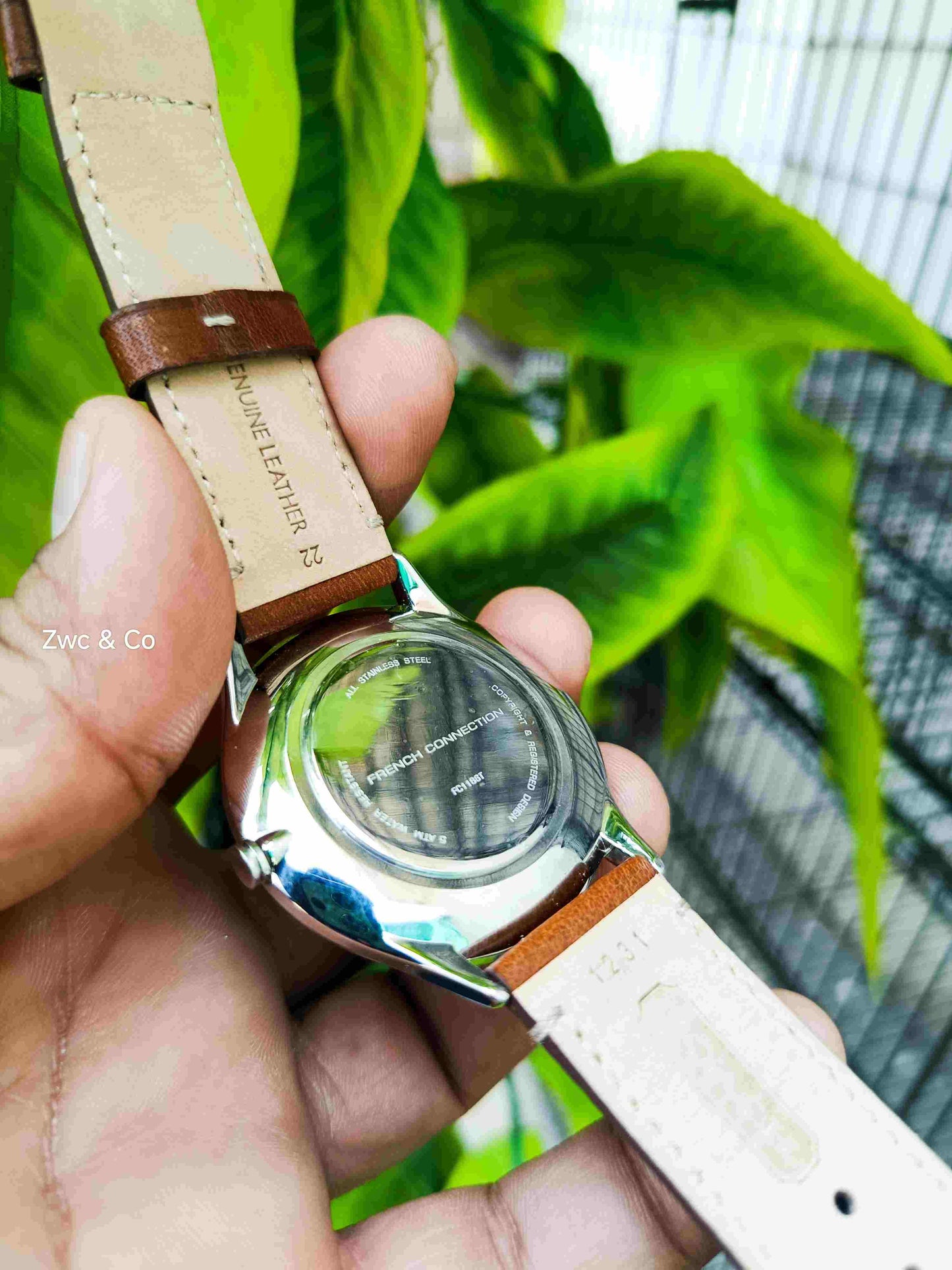 French Connection Men’s Analog Watch Case with Brown Leather Strap.