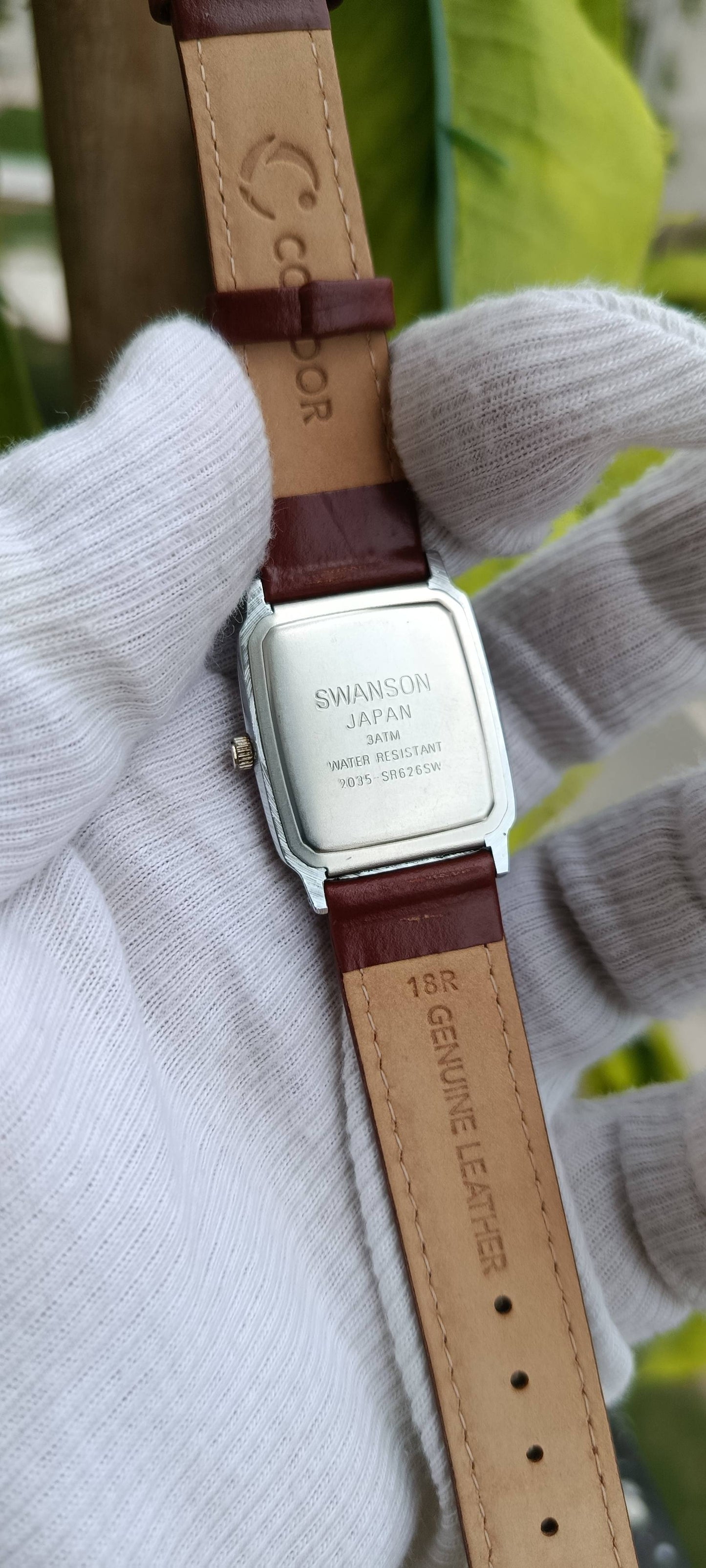 Swanson Japan Men's Watch – Black Rectangular Dial, Silver Case, Reddish-Brown Leather Strap