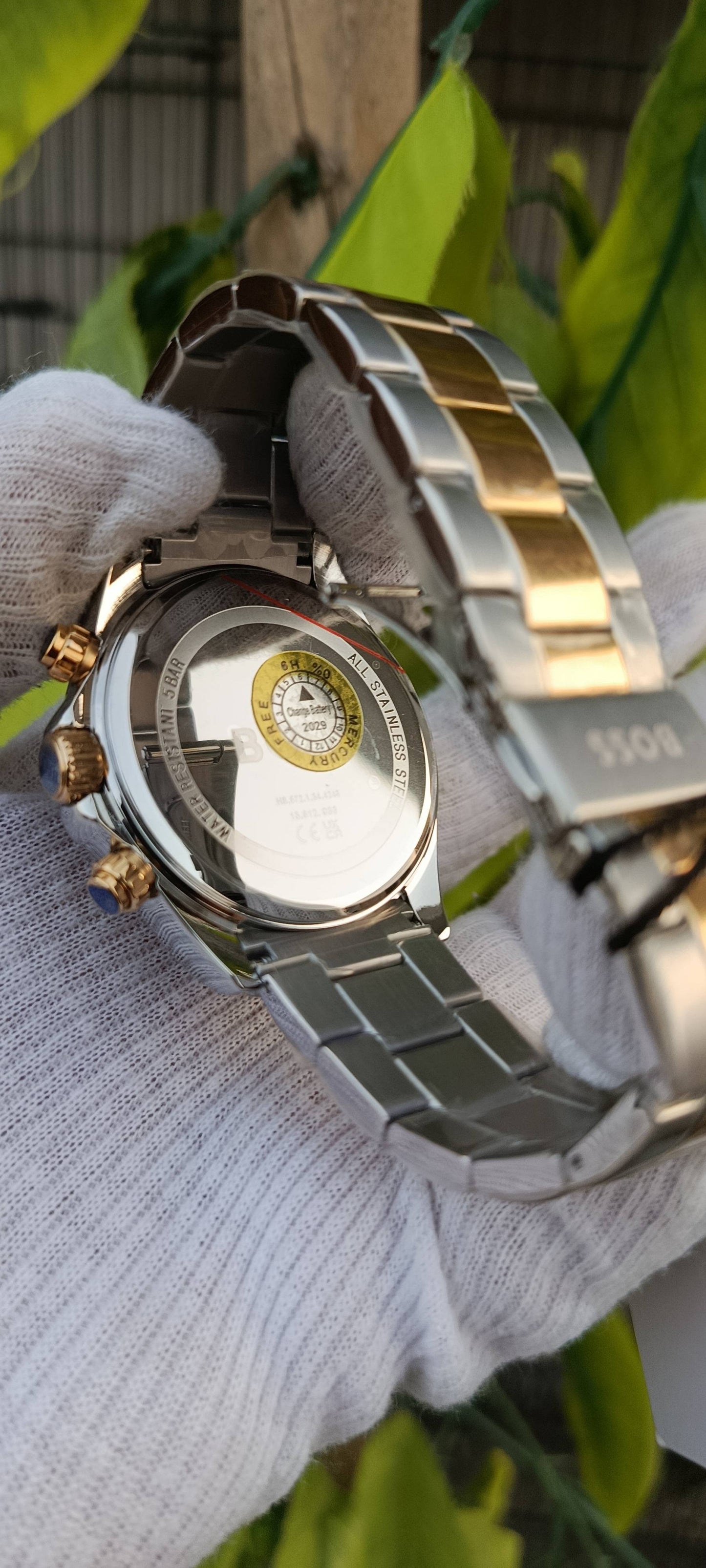 Hugo BOSS two-tone chronograph (model HB1513863-style, ref HB.673.1.54.4348)