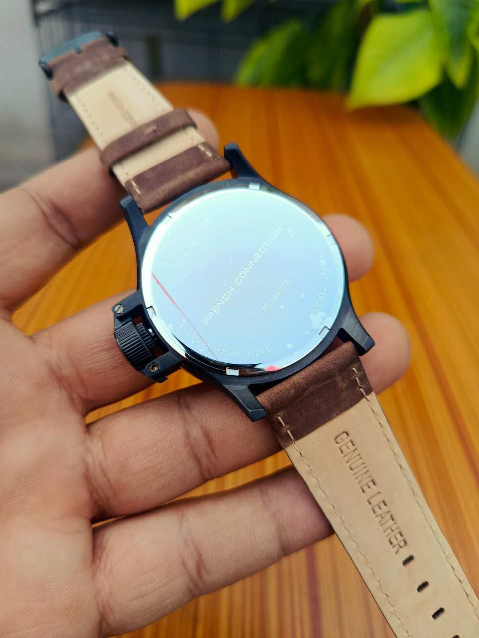 French Connection FC1240TB analog watch for men with a black dial and brown leather strap.