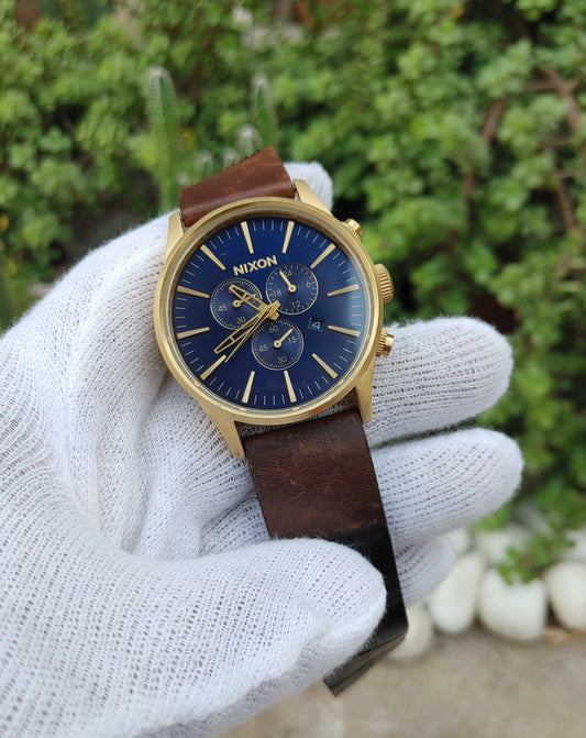 Nixon Blue Dial Gold Case Chornograph Watch For Men