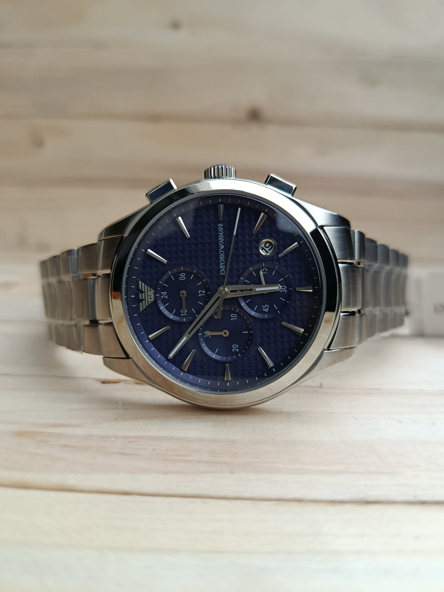 This watch is an Emporio Armani Renato Chronograph, specifically model AR11528 or AR11578