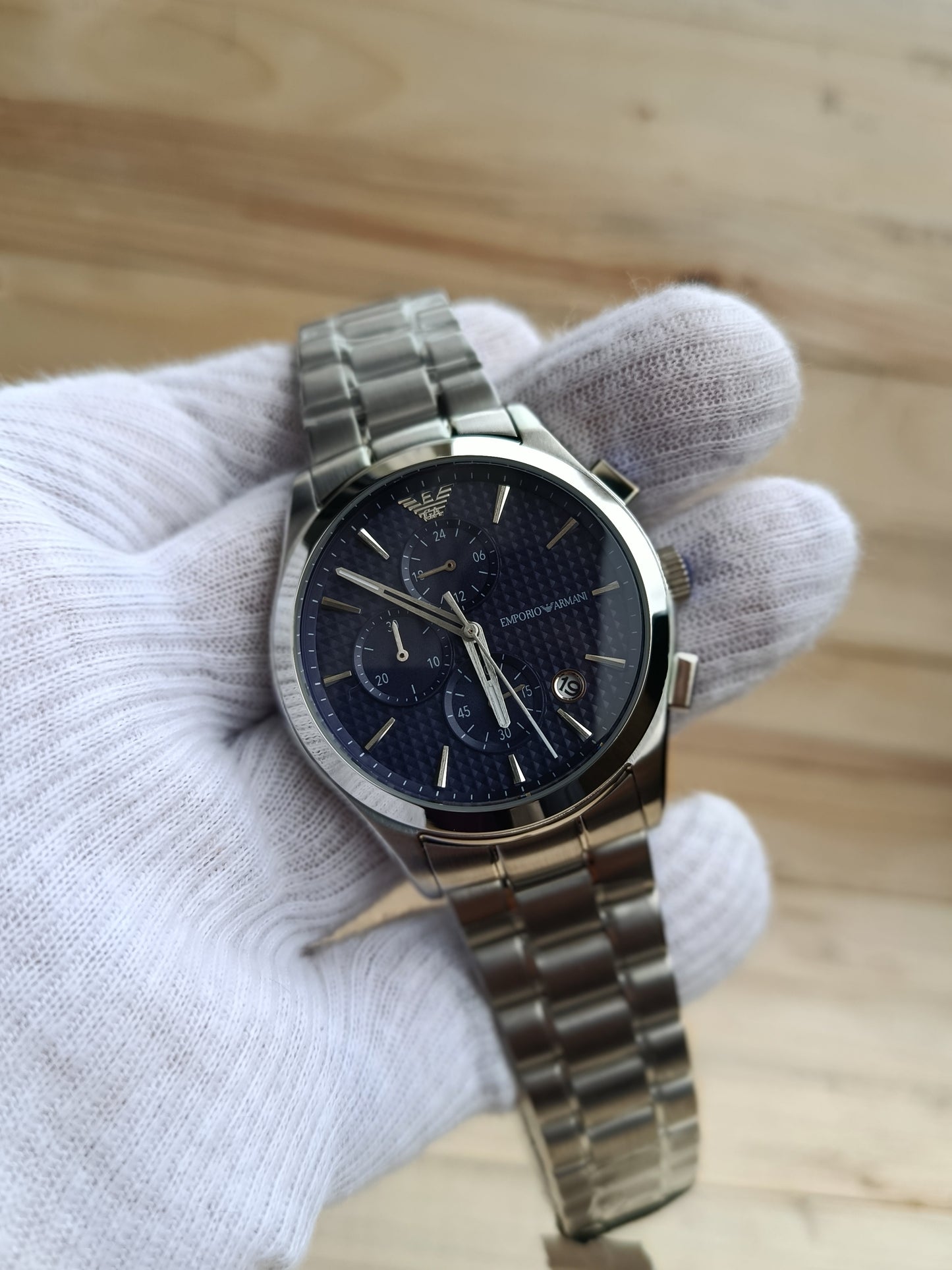 This watch is an Emporio Armani Renato Chronograph, specifically model AR11528 or AR11578