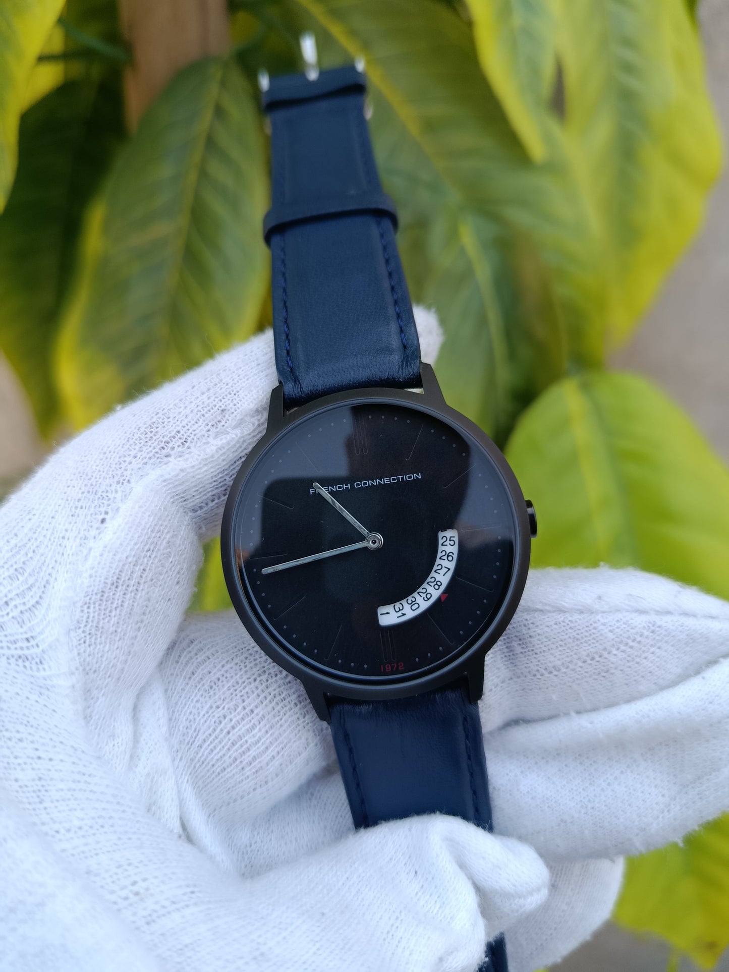 French Connection Men's Minimalist Watch – Black PVD Case, Navy Blue Leather Strap, Black Dial & Curved Retrograde Date Display