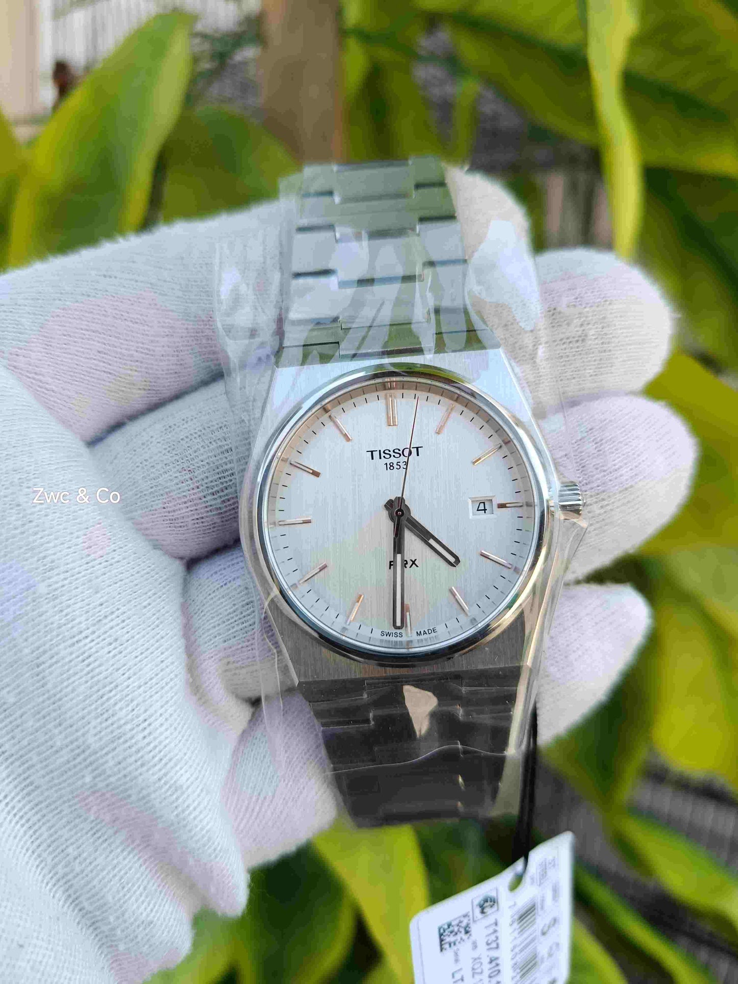 Tissot PRX 1853 Swiss Made Quartz White Silver Textured Dial Rose Gold Indices Stainless Steel Bracelet Men's Watch with Date Display