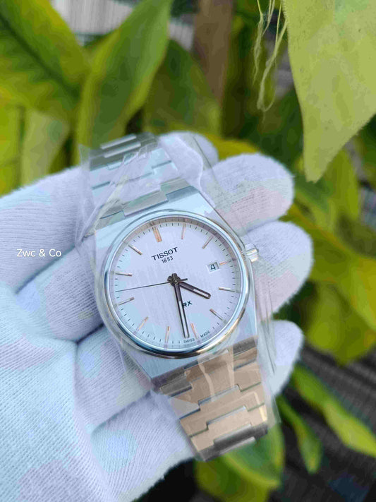 Tissot PRX 1853 Swiss Made Quartz White Silver Textured Dial Rose Gold Indices Stainless Steel Bracelet Men's Watch with Date Display
