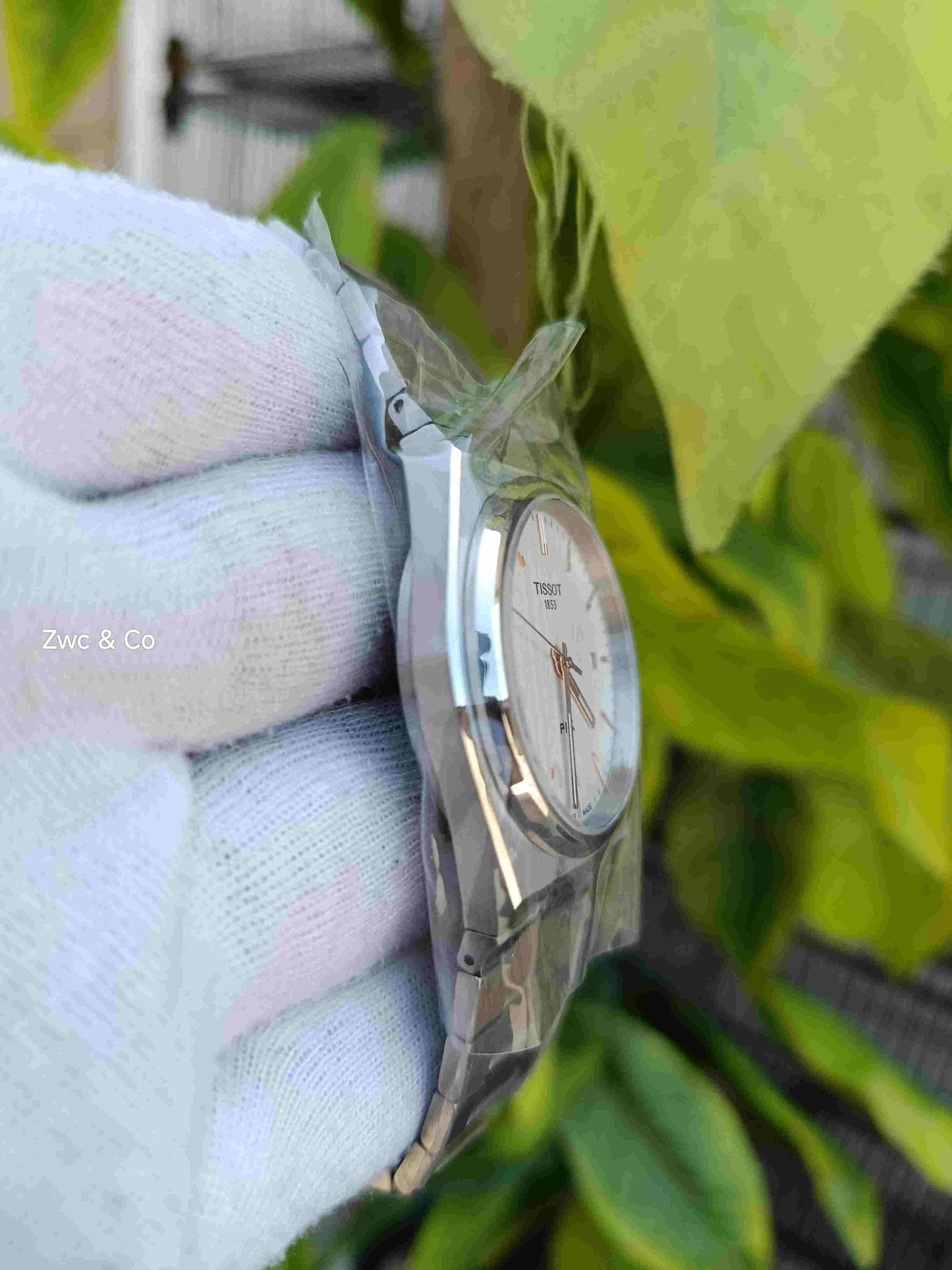 Tissot PRX 1853 Swiss Made Quartz White Silver Textured Dial Rose Gold Indices Stainless Steel Bracelet Men's Watch with Date Display