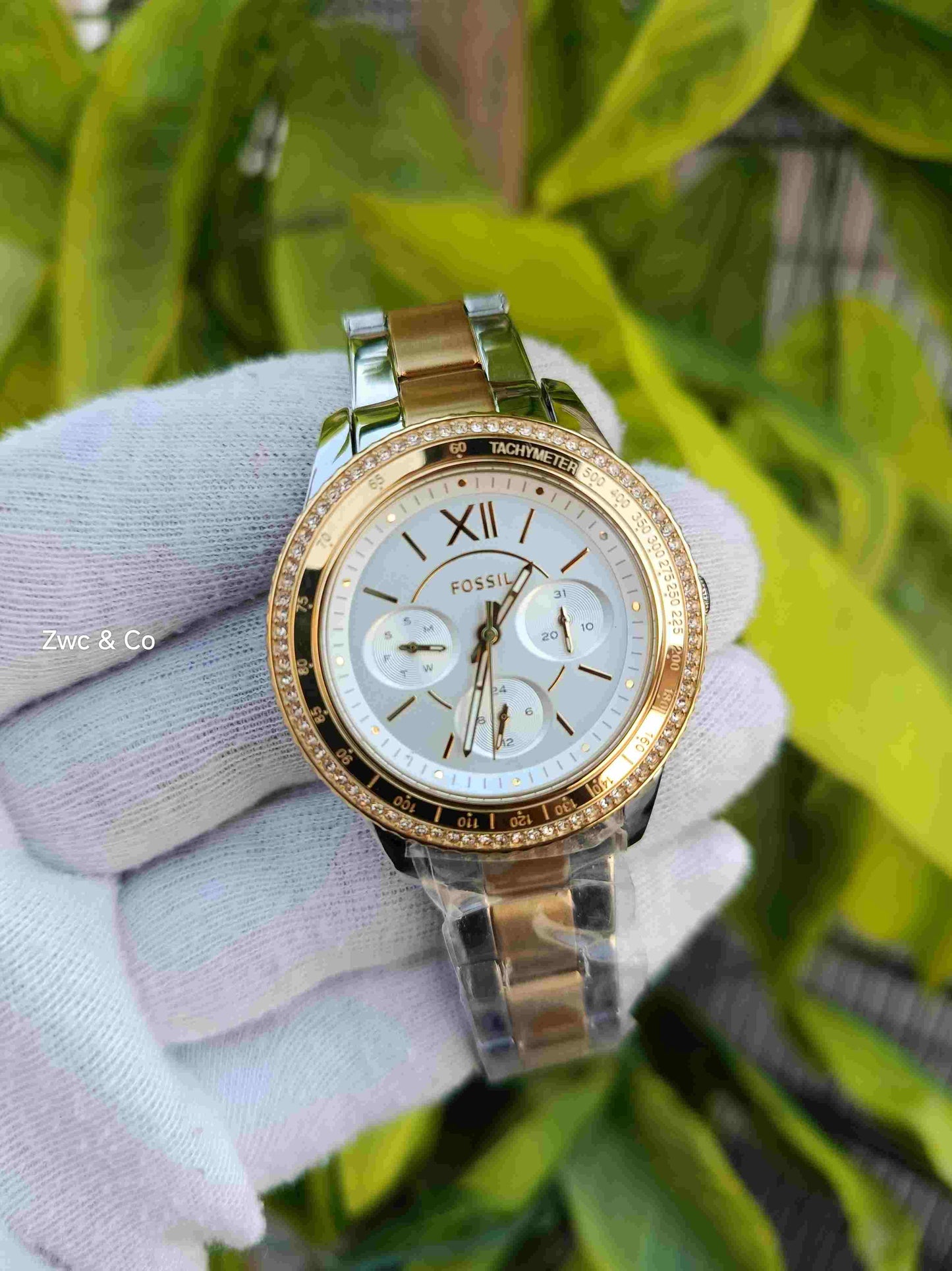 Fossil Multifunction Chronograph White Dial Crystal-Studded Tachymeter Bezel Two-Tone Rose Gold & Silver Stainless Steel Bracelet Women's Watch