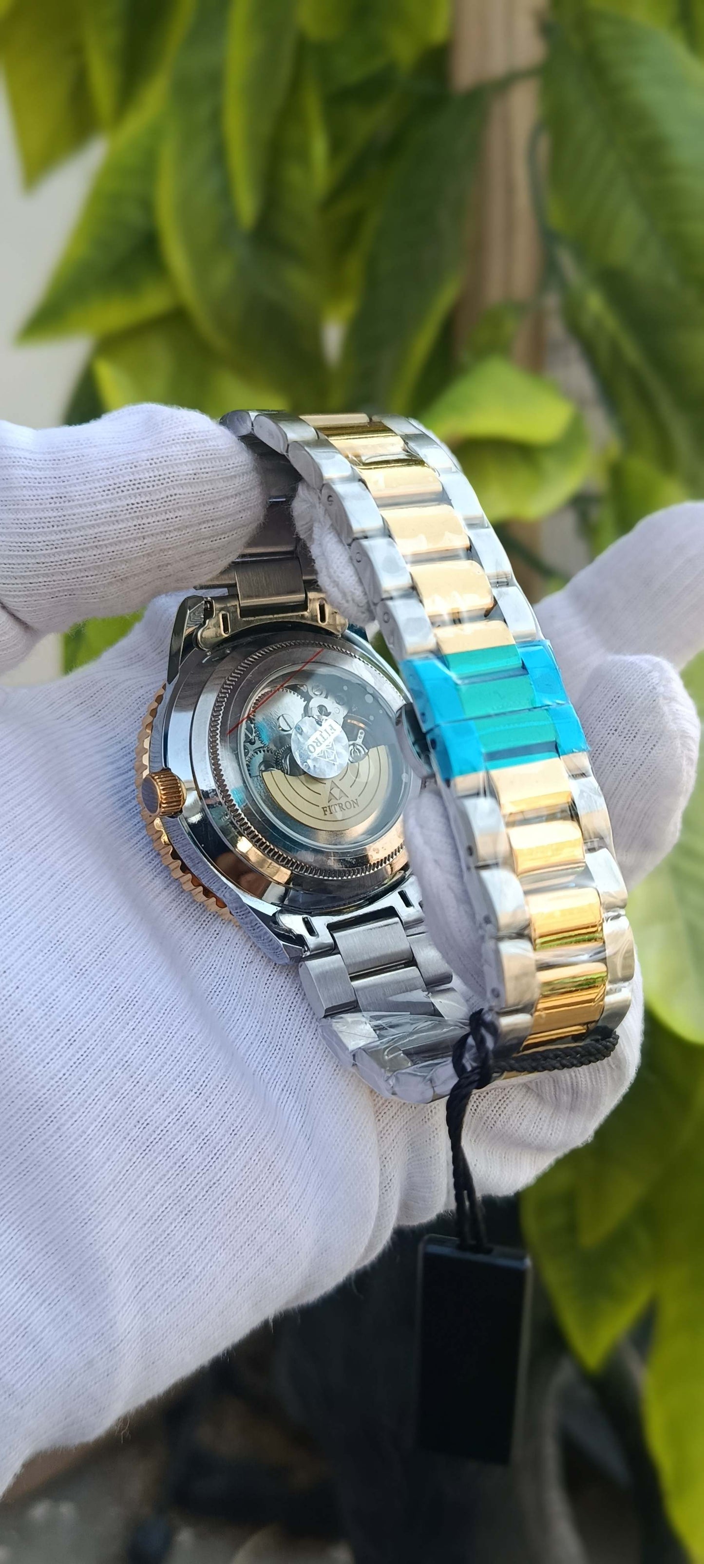 Fitron Skeleton Dial Diver-Style Watch – Teal Bezel & Two-Tone Bracelet