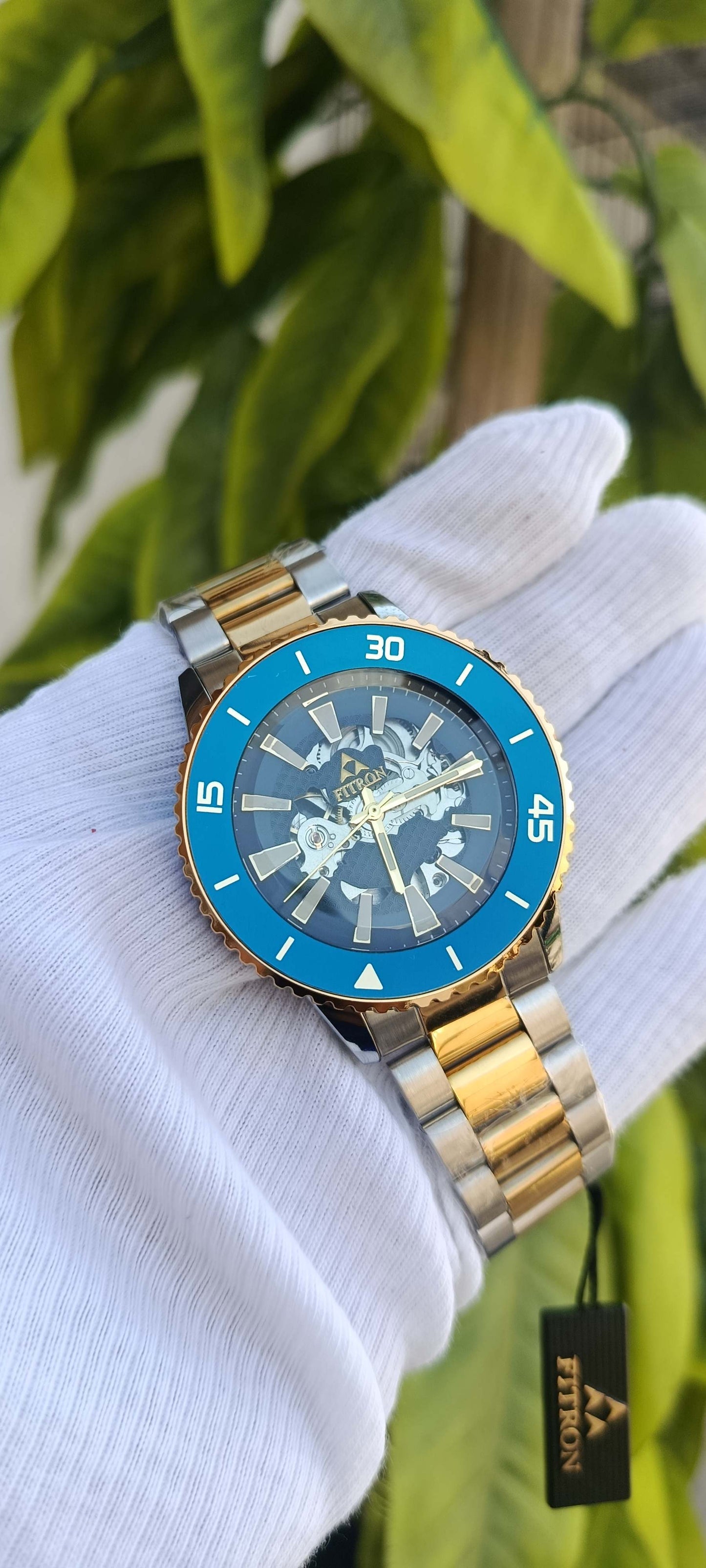 Fitron Skeleton Dial Diver-Style Watch – Teal Bezel & Two-Tone Bracelet