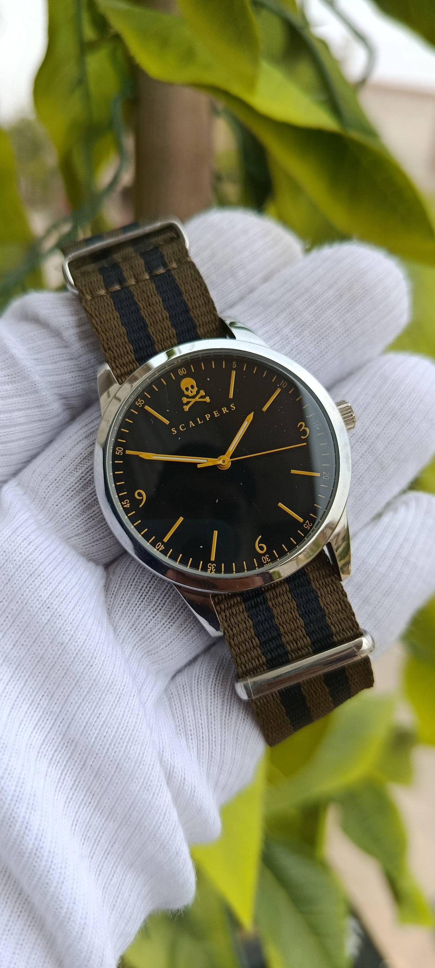 Scalpers Skull Logo Men's Watch – Black Dial with Yellow Accents, Olive & Black Striped NATO Strap
