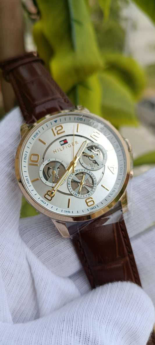Tommy Hilfiger Harrison Men's Multifunction Watch – Silver Skeleton Dial, Gold-Tone Case, Brown Leather Strap | Ref. 1790874
