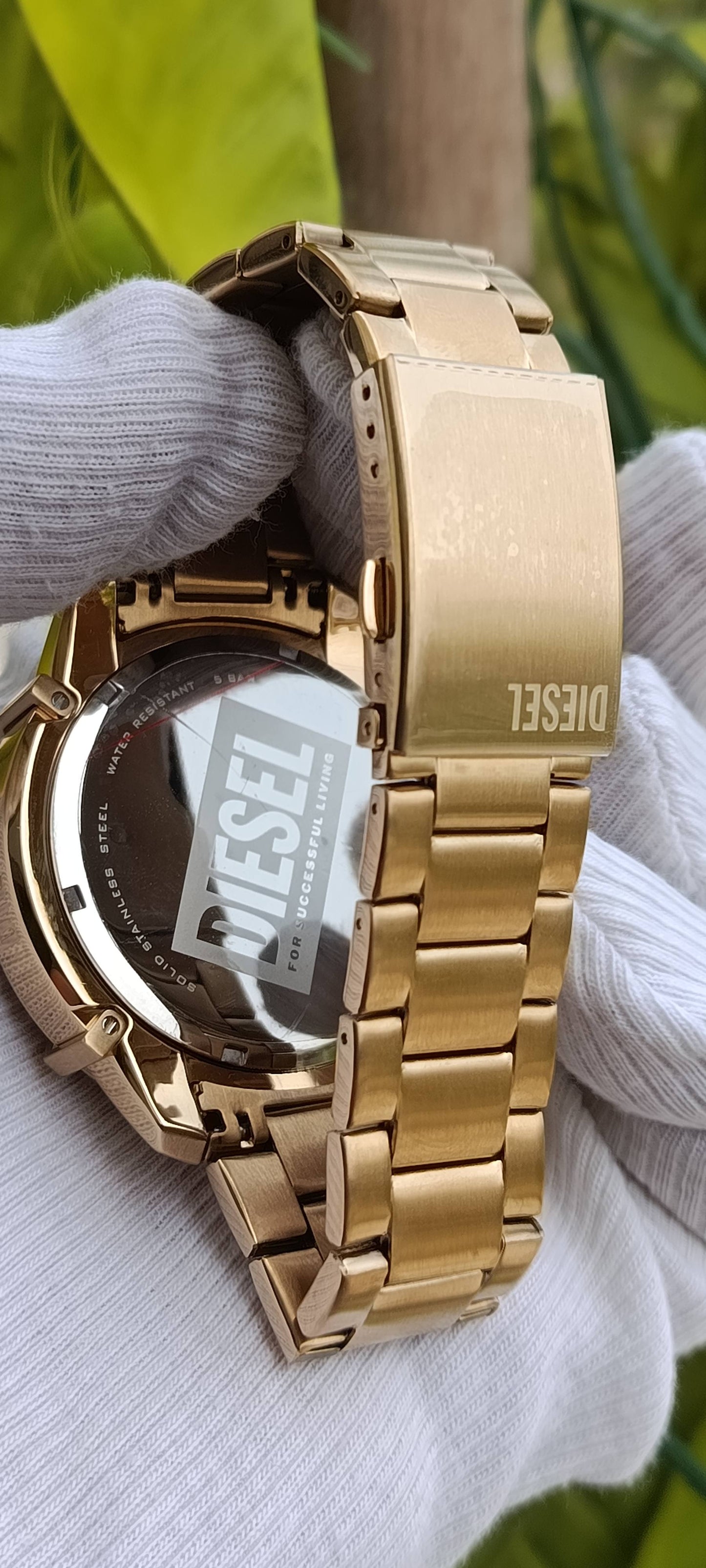 Diesel Griffed Chronograph Men's Watch – Gold-Tone Stainless Steel, Red "For Successful Living" Dial (48mm)