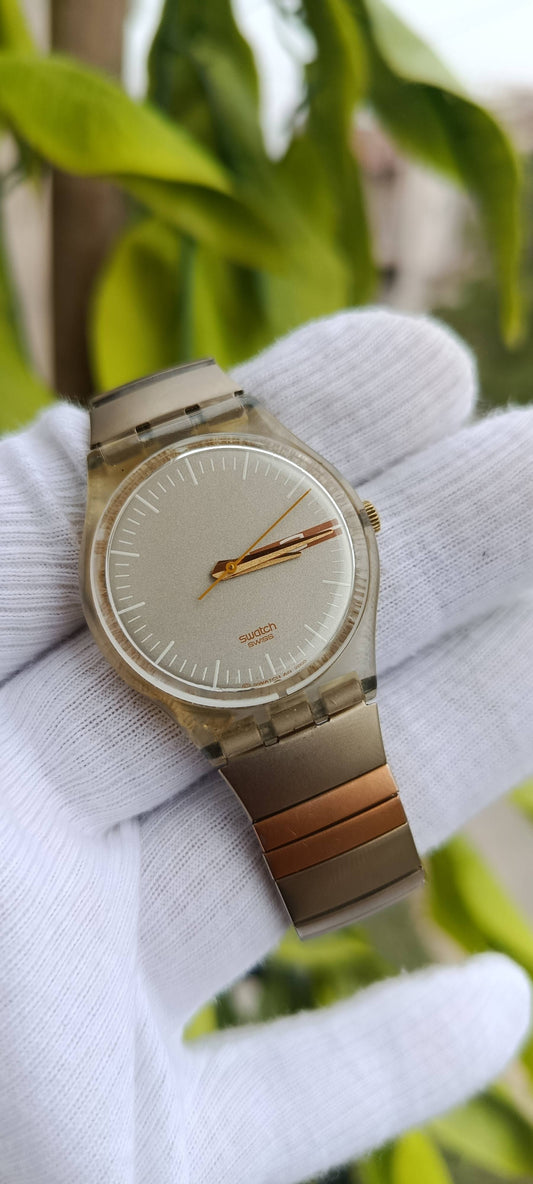 Swatch Swiss AG 2000 Minimalist Watch, Transparent Case, Metal Bracelet