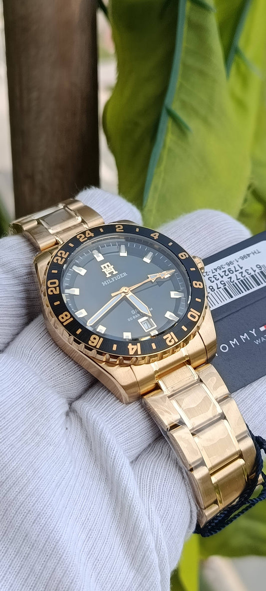 Tommy Hilfiger TH85 GMT Men's Watch 1792133 – Black Dial, Gold-Tone Case, Stainless Steel Bracelet
