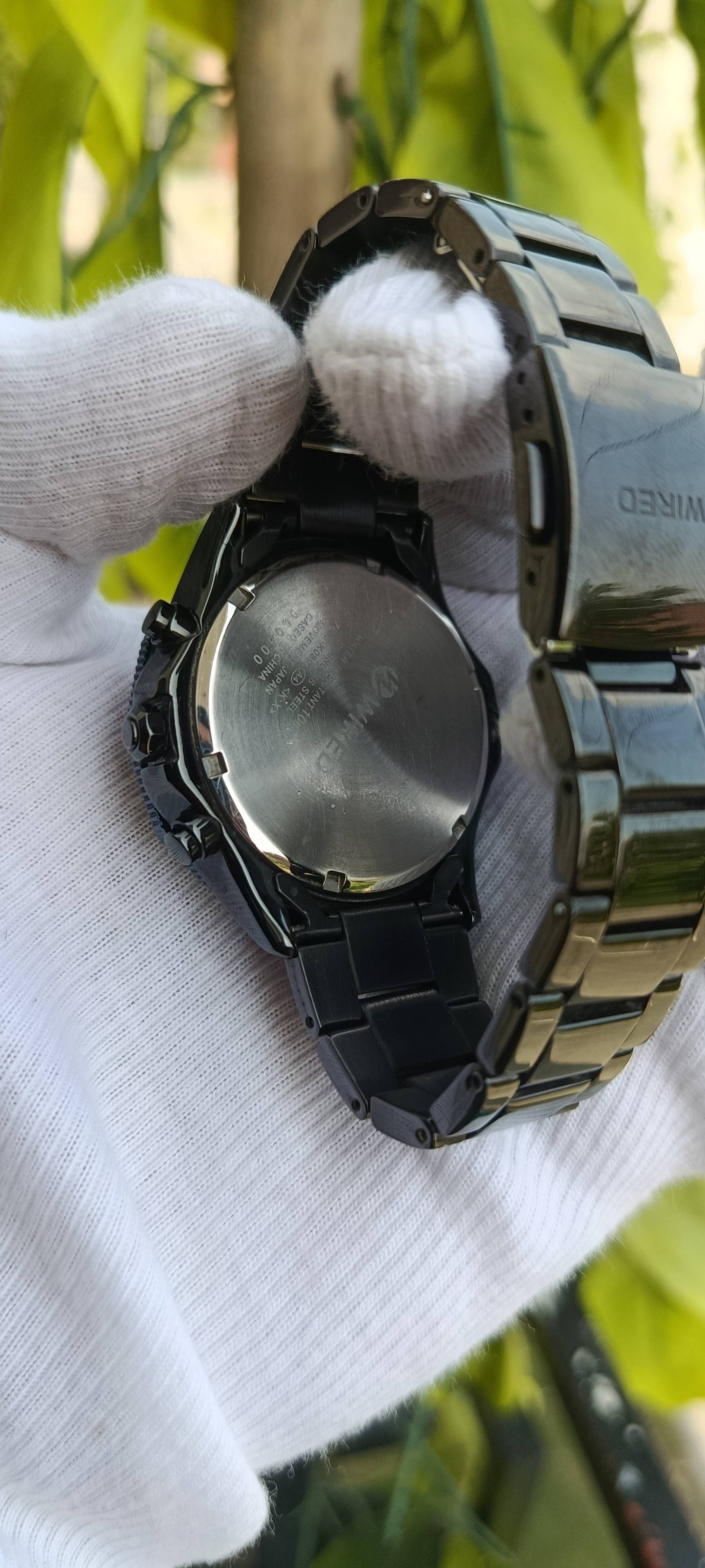 Seiko Wired Chronograph Watch | Blue Sunburst Multi-Dial Face | Tachymeter Bezel | 24-Hour Subdial | Date Display | Gold-Tone Hands | Black IP Stainless Steel Case & Bracelet | Movement 8T63