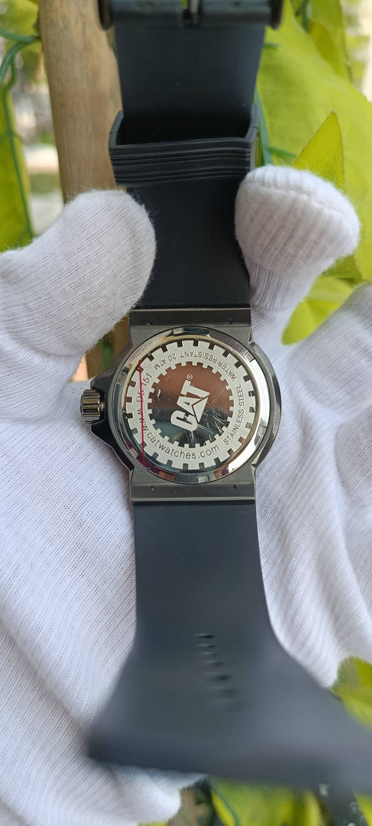 CAT (Caterpillar) Diver-Style Watch | Black Wave-Textured Dial | Luminous Markers | Unidirectional Rotating Bezel | 200m/660ft Water Resistant | Stainless Steel Case | Black Rubber Strap | Ref. DP.151