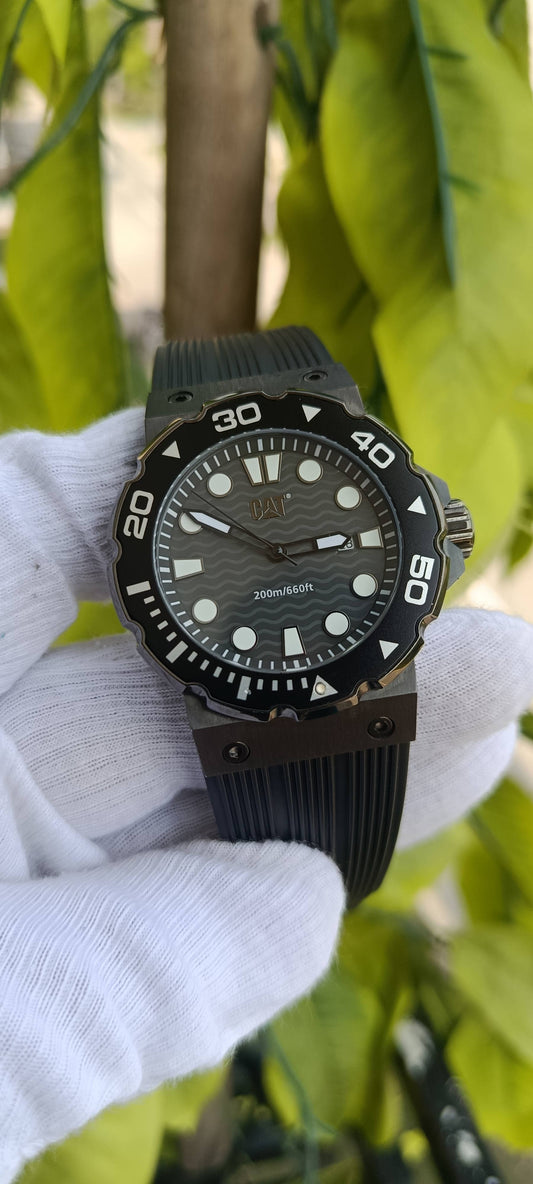CAT (Caterpillar) Diver-Style Watch | Black Wave-Textured Dial | Luminous Markers | Unidirectional Rotating Bezel | 200m/660ft Water Resistant | Stainless Steel Case | Black Rubber Strap | Ref. DP.151
