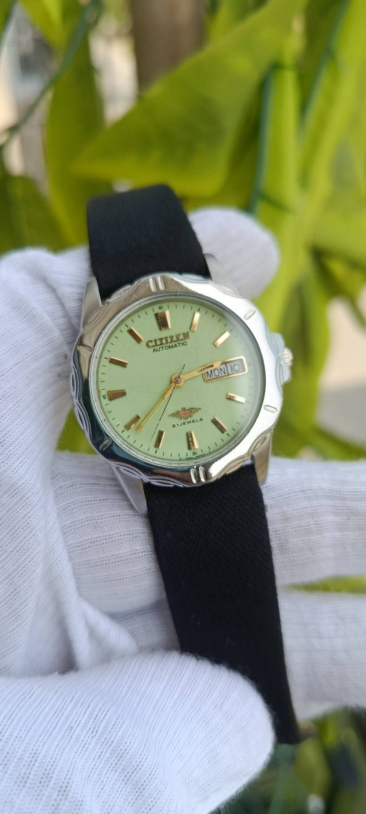 Vintage Citizen Automatic Watch | Mint Green Dial | Gold-Tone Baton Markers & Hands | Day-Date Function | 21 Jewels | Ornate Carved Case | Ref. 1032-R024102RC | Black Fabric Strap