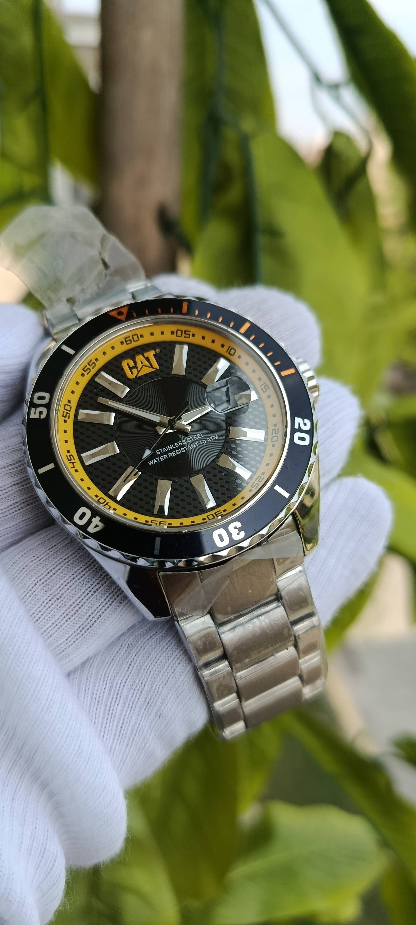 CAT (Caterpillar) Diver-Style Watch | Black Textured Dial | Yellow Accent Ring | Rotating Bezel | Date Window