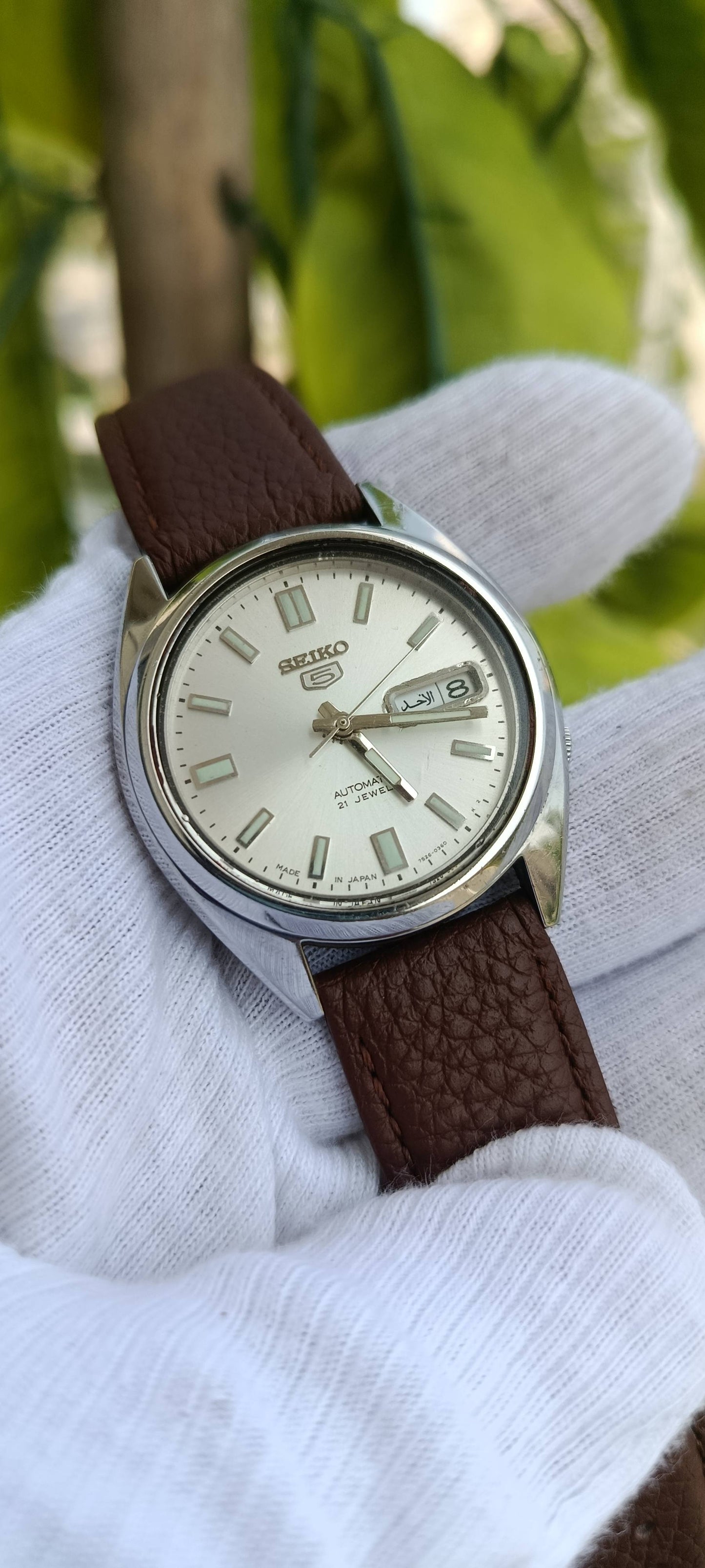 Vintage Seiko 5 Automatic Watch | Silver Sunburst Dial | Luminous Baton Markers | Arabic Day & Date Function | 21 Jewels | Ref. 7S26-0360 | Brown Genuine Leather Strap