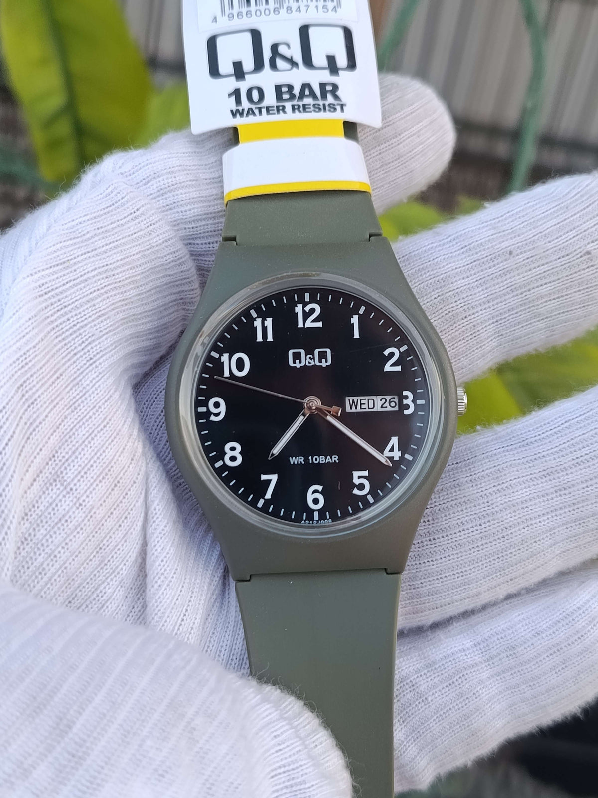 Q&Q A212J008Y Analog Watch | Black Dial with White Numerals | Day & Date | Olive Green Resin Case & Strap | 10 BAR