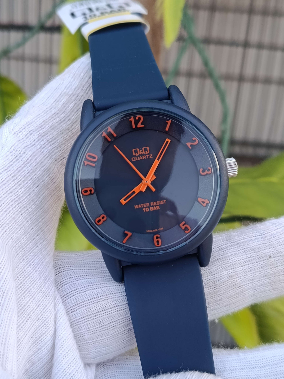Q&Q Analog Quartz Watch – Navy Blue Resin Case & Strap, Orange Numerals, 10 BAR Water Resistant