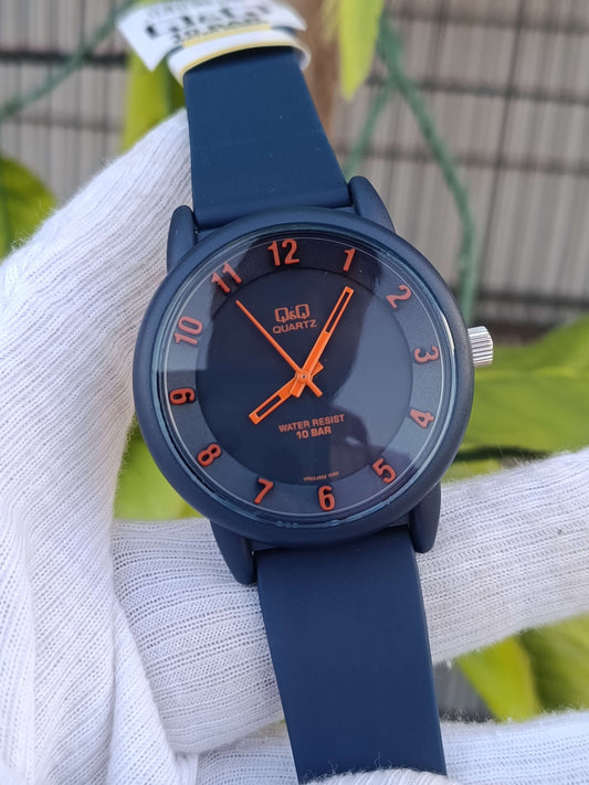 Q&Q Analog Quartz Watch – Navy Blue Resin Case & Strap, Orange Numerals, 10 BAR Water Resistant