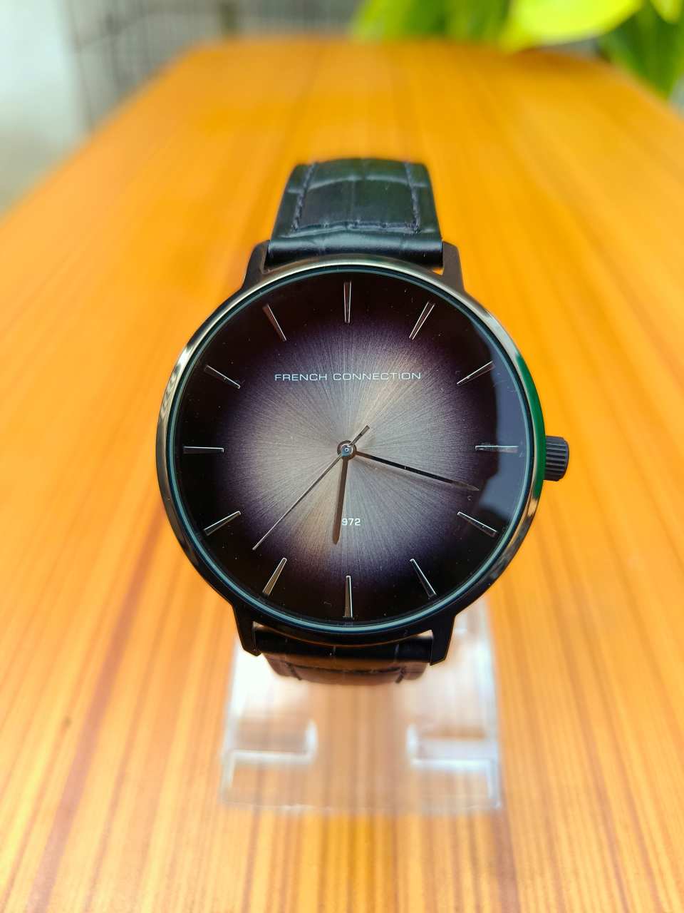 French Connection FC1306BB men's analogue quartz watch with a black dial and a black leather strap.