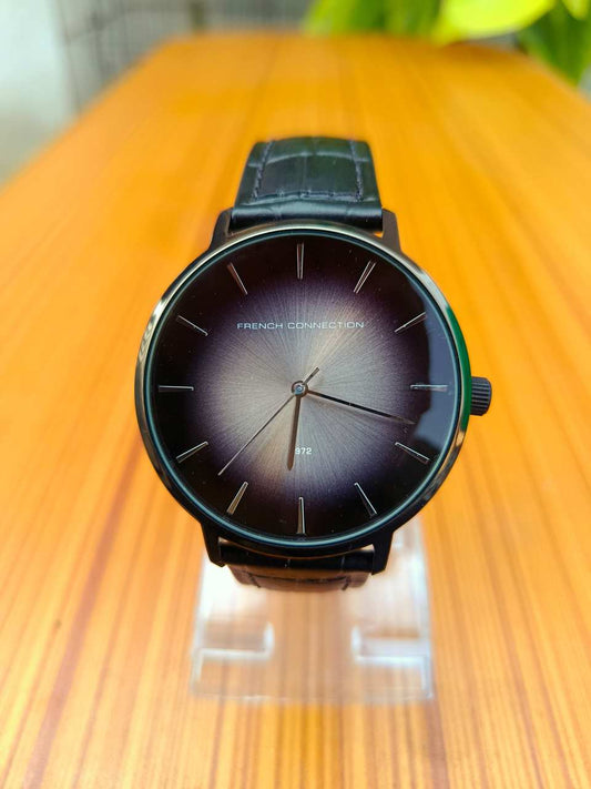 French Connection FC1306BB men's analogue quartz watch with a black dial and a black leather strap.