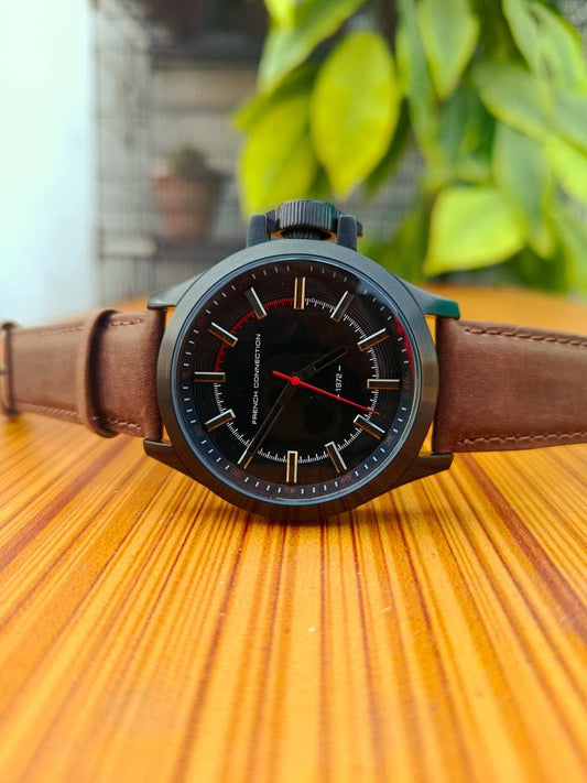 French Connection FC1240TB analog watch for men with a black dial and brown leather strap.